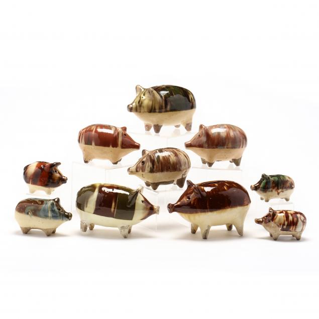 a-group-of-ten-rockingham-style-pottery-pigs