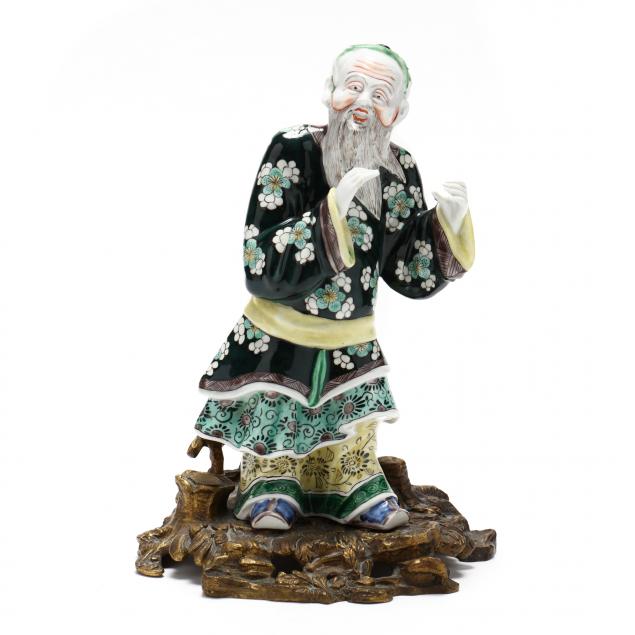a-chinese-famille-verte-porcelain-figure-in-ormulu-mount