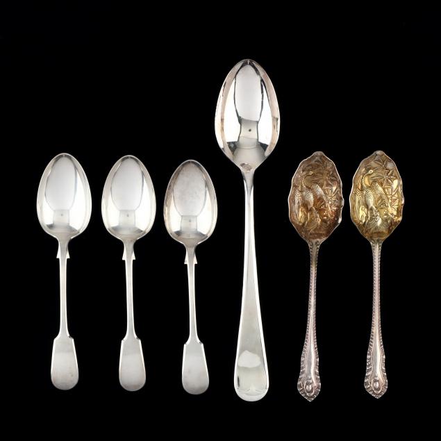 a-grouping-of-six-english-silverplate-serving-spoons