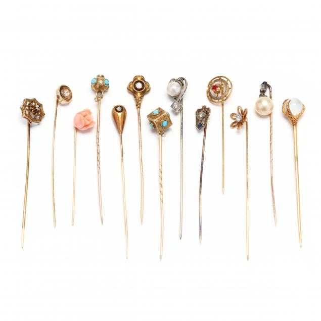group-of-gold-and-gem-set-stick-pins