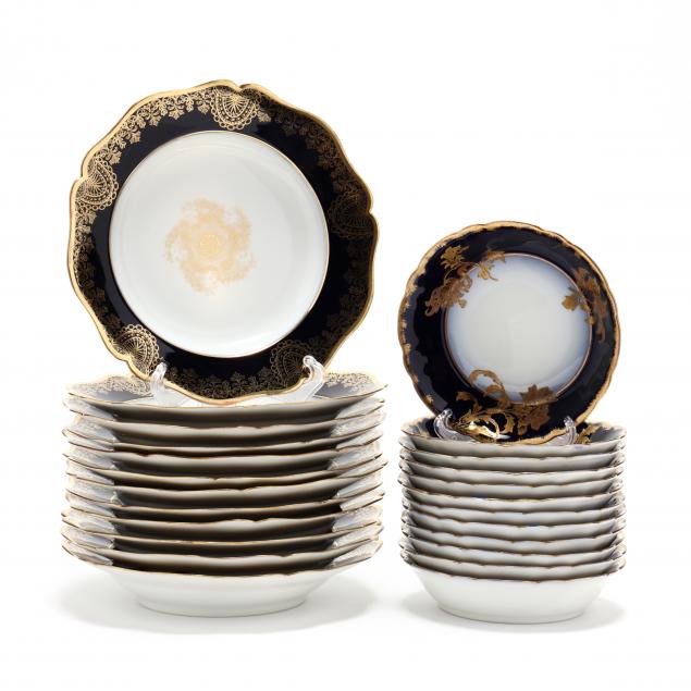 a-collection-of-cobalt-gilt-decorated-limoges-porcelain-bowls