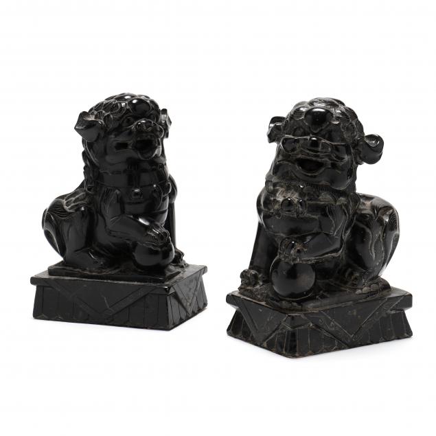 a-pair-of-black-marble-asian-foo-lions