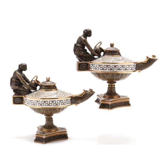 a-pair-of-figural-porcelain-oil-lamps