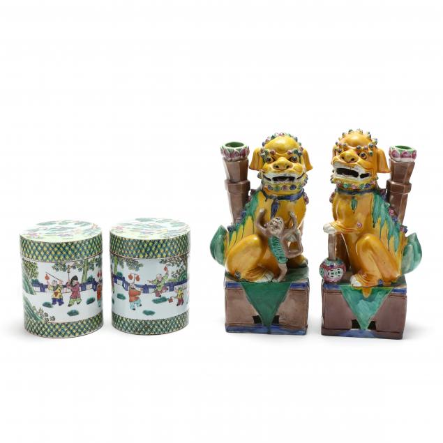 a-pair-of-chinese-porcelain-foo-lion-candlesticks-and-lidded-boxes
