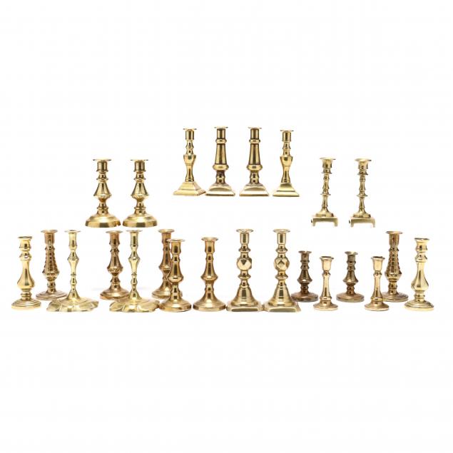 twelve-pairs-of-miniature-turned-brass-candlesticks