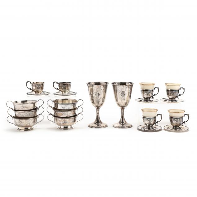a-collection-of-sterling-silver-cups-and-goblets