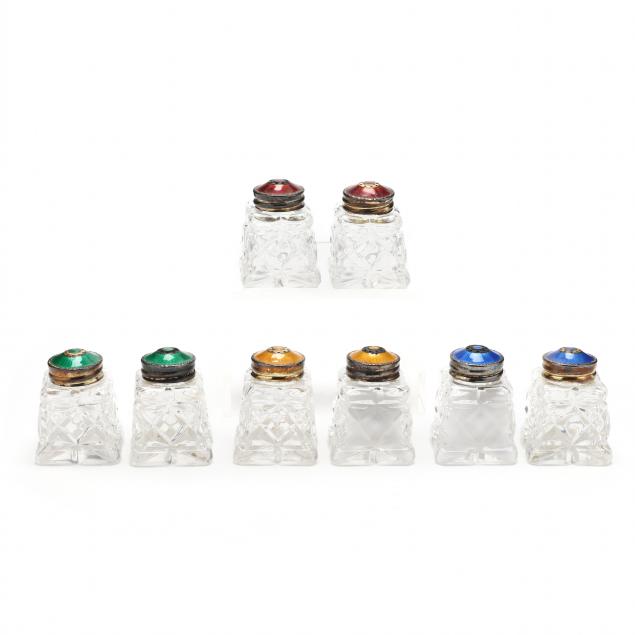 a-set-of-eight-shakers-with-enameled-sterling-silver-caps