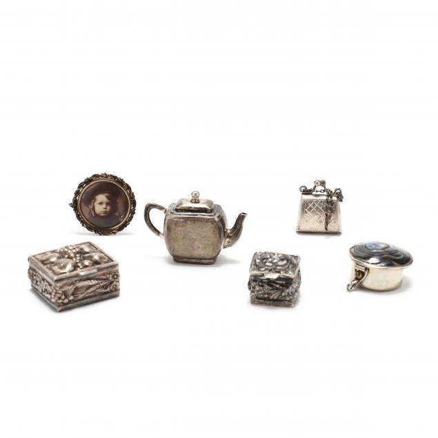 a-collection-of-six-diminutive-silver-and-copper-pieces