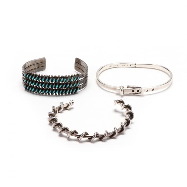 three-silver-bracelets