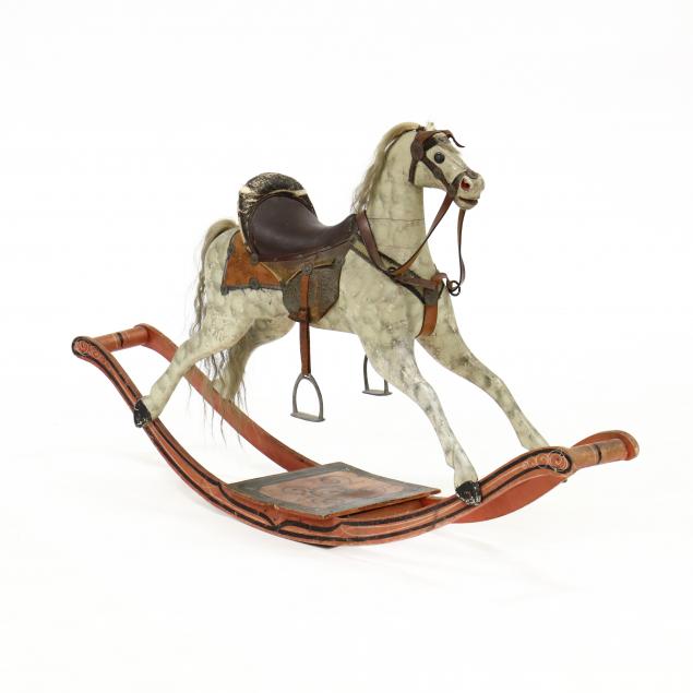 antique-carved-and-painted-rocking-horse