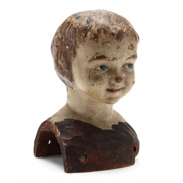carved-and-painted-wooden-doll-head