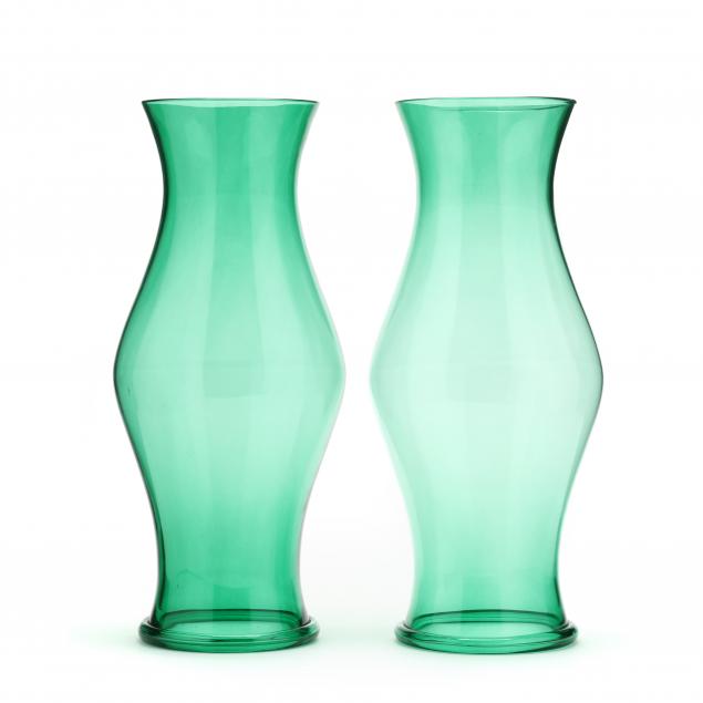 a-pair-of-green-glass-hurricane-shades