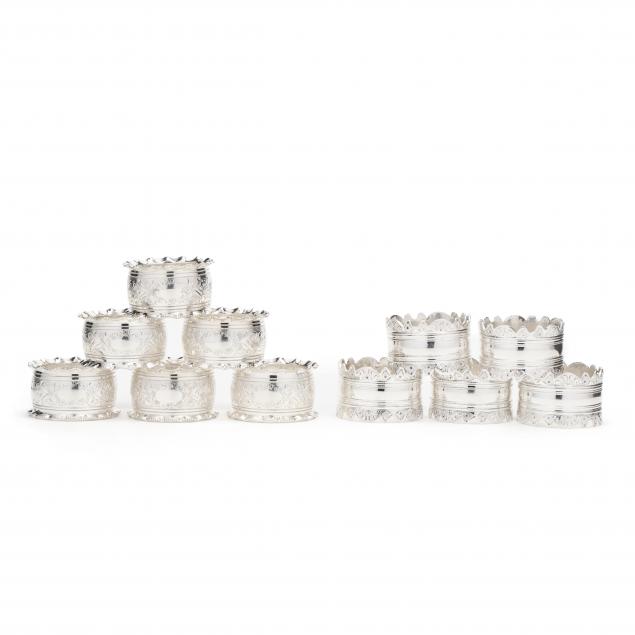 an-assembled-set-of-eleven-silverplate-napkin-rings