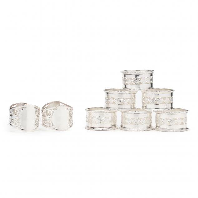 an-assembled-set-of-eight-silverplate-napkin-rings