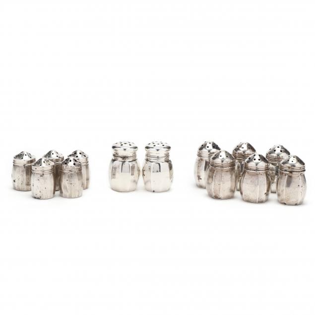 an-assembled-set-of-thirteen-individual-sterling-silver-shakers