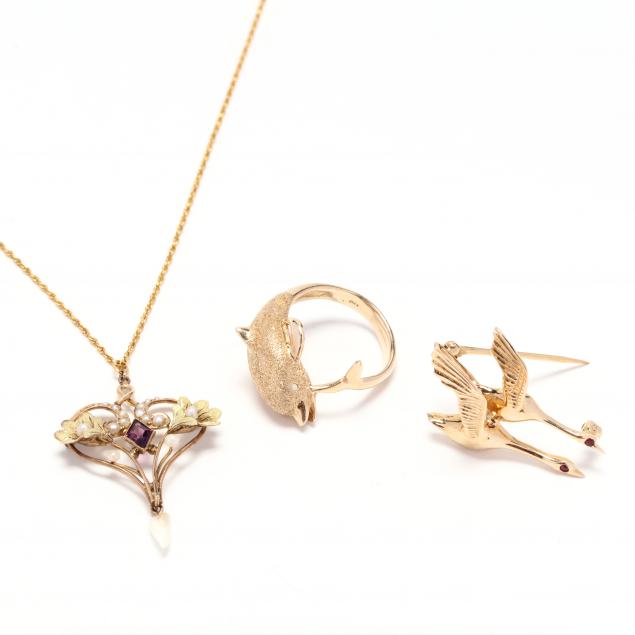 three-gold-jewelry-items