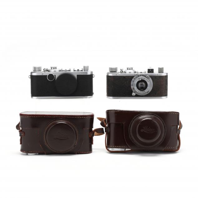 pair-of-vintage-leica-d-r-p-leitz-wetzlar-cameras-one-with-lens