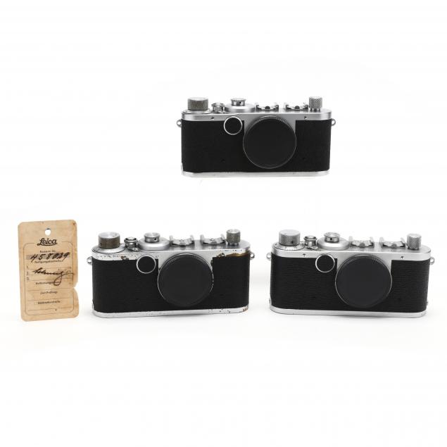 three-vintage-leica-d-r-p-leitz-wetzlar-rangefinder-cameras-each-without-lens