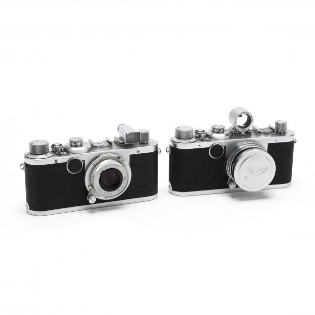 two-vintage-leica-d-r-p-leitz-wetzlar-rangefinder-cameras-each-with-lens