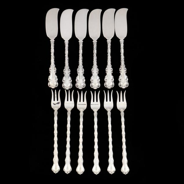 a-grouping-of-antique-sterling-silver-flatware