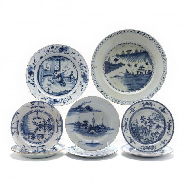 a-group-of-eight-delft-and-english-blue-and-white-plates