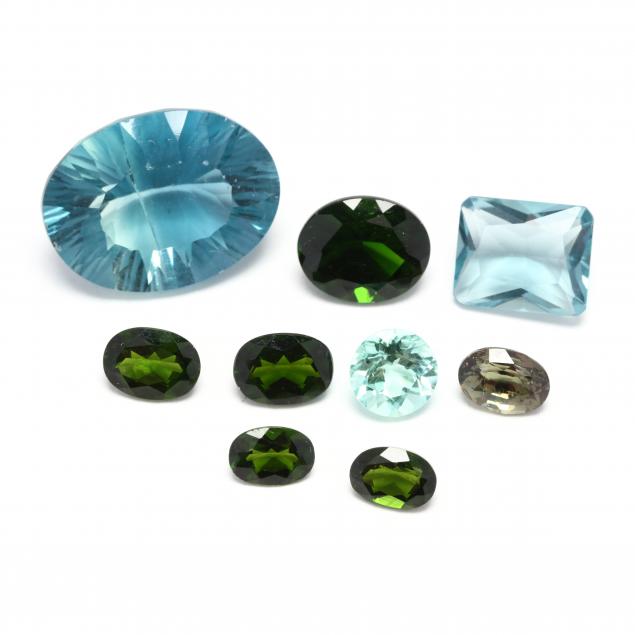 group-of-loose-green-gemstones