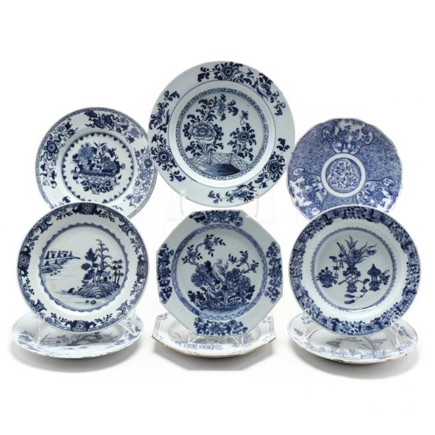 a-group-of-nine-delft-blue-and-white-plates