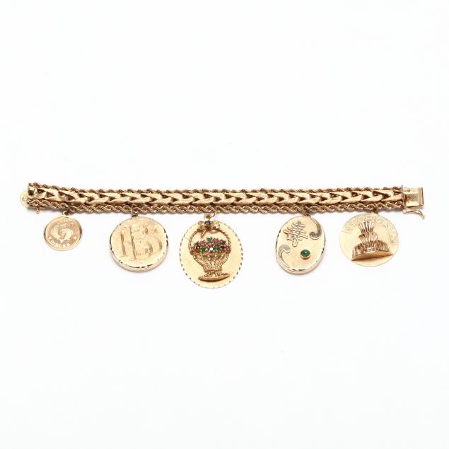 14kt-gold-bracelet-with-vintage-charms-and-lockets
