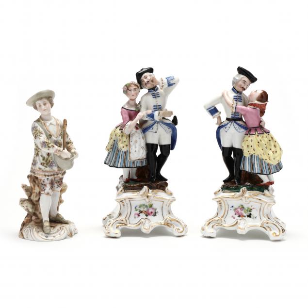 three-porcelain-figurines