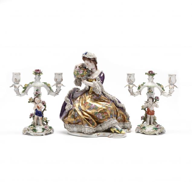 a-large-dresden-lace-figurine-of-a-woman-on-a-bench-and-candelabra