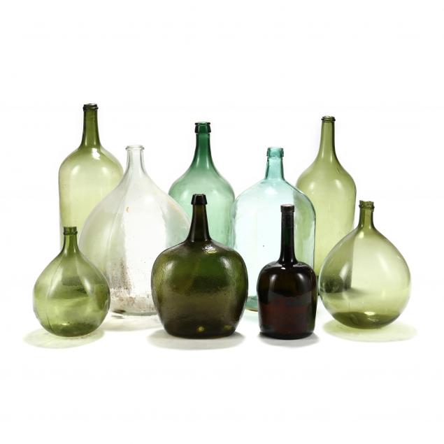 nine-vintage-and-antique-demijohn-bottles