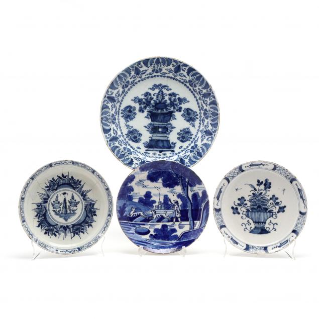 four-blue-and-white-delft-plates