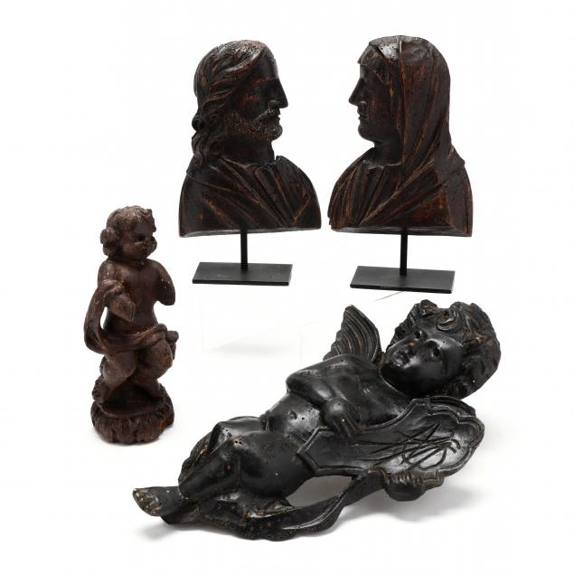 four-religious-wood-carvings
