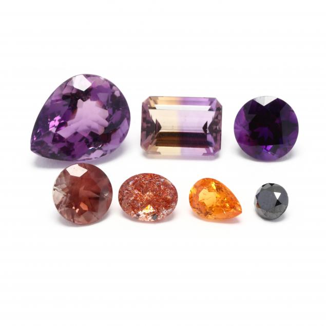 a-group-of-loose-gemstones