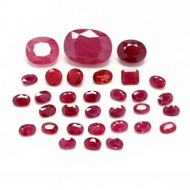 a-group-of-loose-red-gemstones