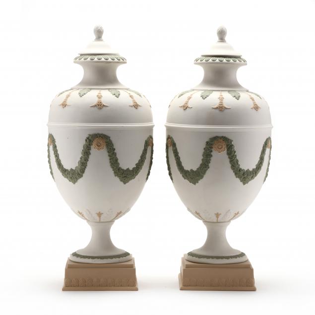 a-pair-of-classical-style-bisque-covered-urns