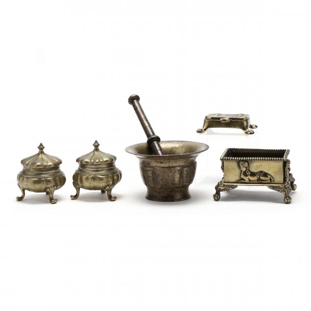 a-grouping-of-five-brass-table-accessories