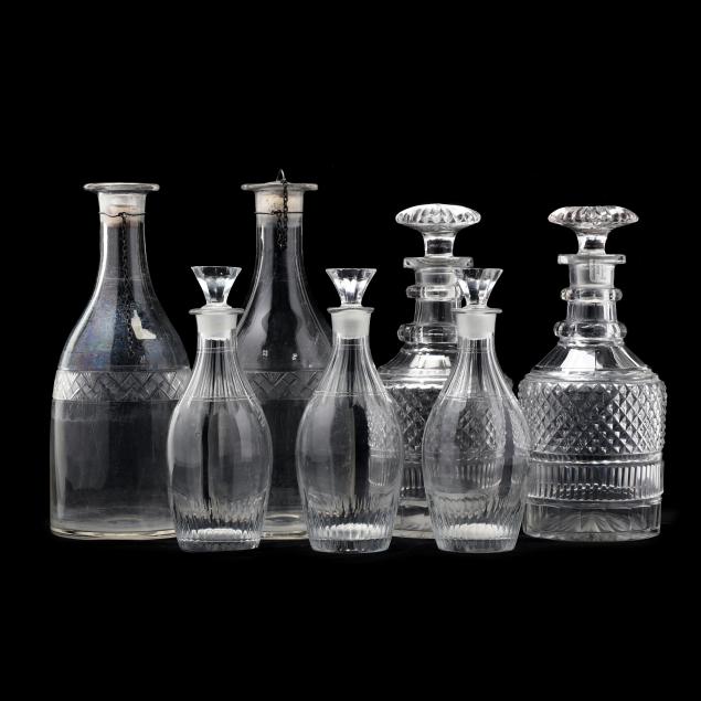 grouping-of-seven-cut-glass-decanters