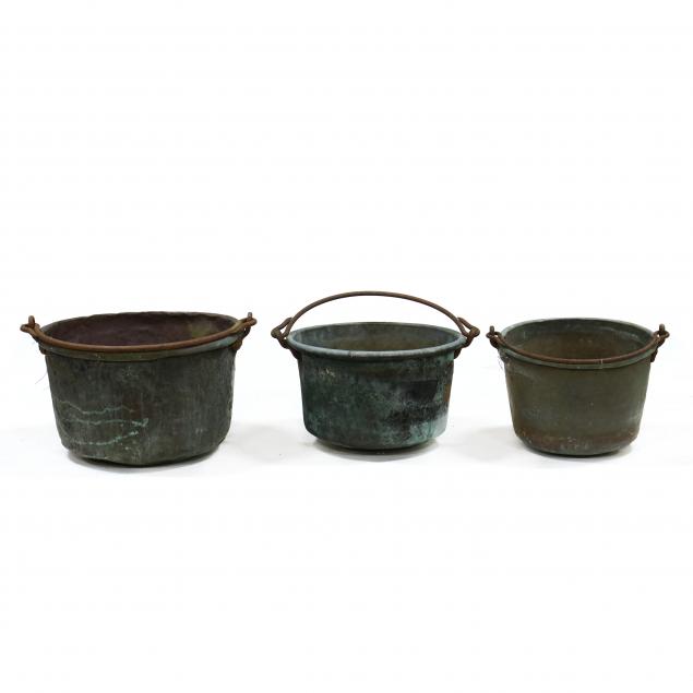 three-large-antique-copper-cauldrons