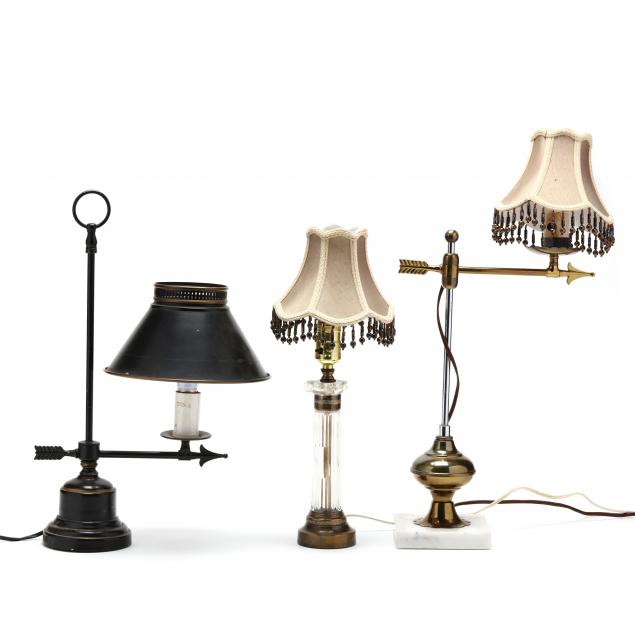 a-grouping-of-three-table-lamps