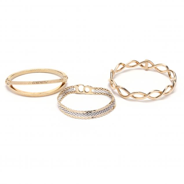 three-gold-bracelets