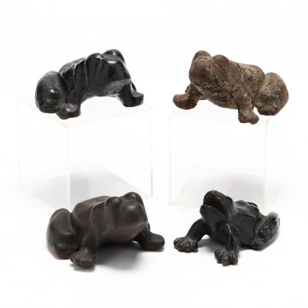 four-cast-iron-frog-doorstops