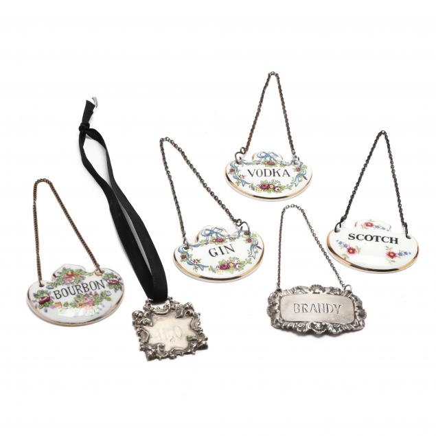a-collection-of-six-vintage-antique-decanter-tags