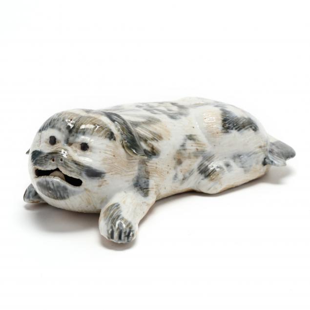 a-chinese-export-style-recumbent-pug-dog