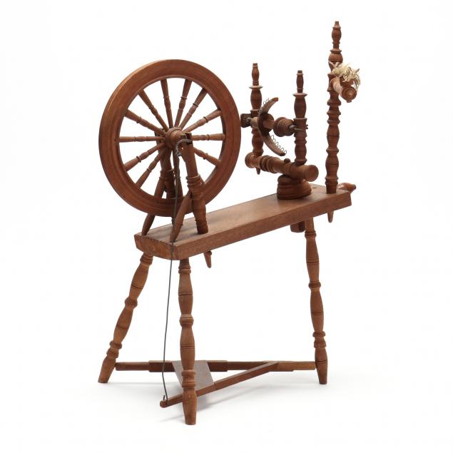 antique-miniature-spinning-wheel