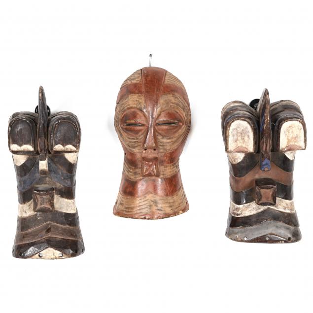 three-carved-and-painted-songye-masks