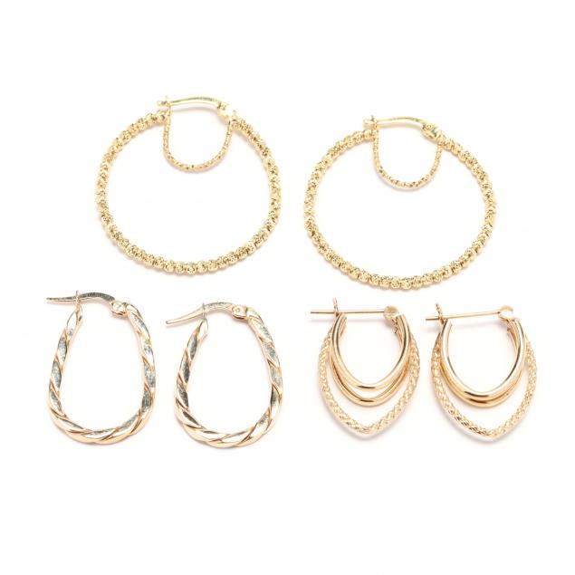 three-pairs-of-gold-ear-hoops