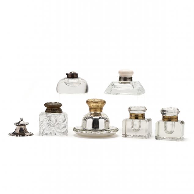 a-grouping-of-seven-antique-continental-inkwells