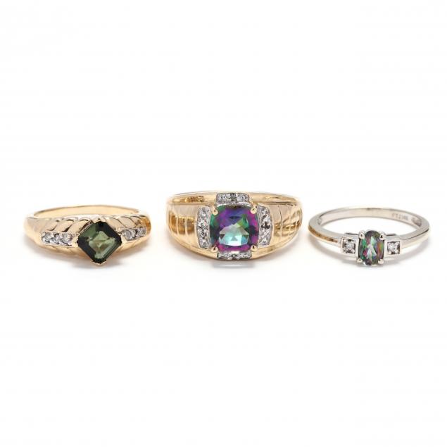 three-gold-and-gem-set-rings