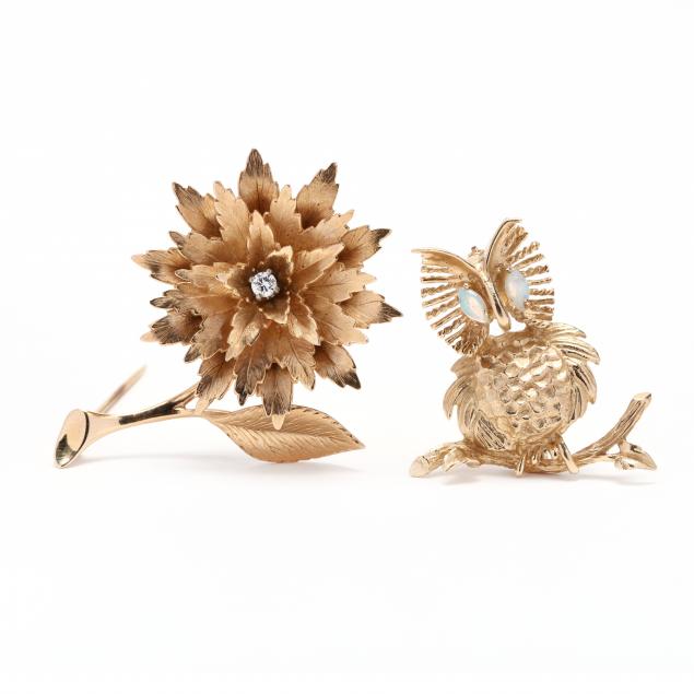 two-gold-and-gem-set-brooches